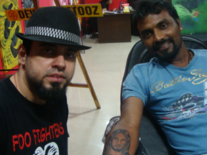 Remo Dsouza getting his tattoo